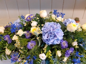 BLUE AND WHITE CASKET SPRAY